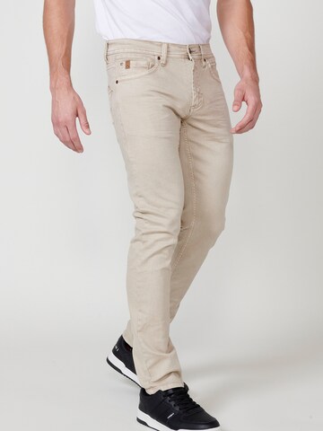 Coupe slim Jean KOROSHI en beige