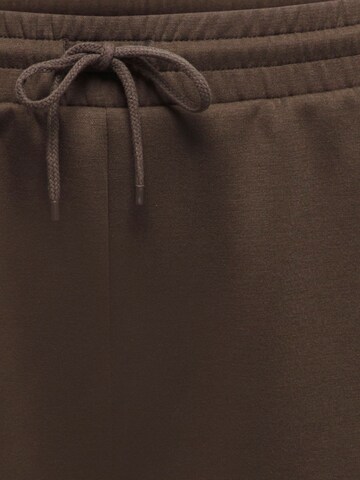 ONLY Carmakoma - Pierna ancha Pantalón 'CARScarlett' en marrón