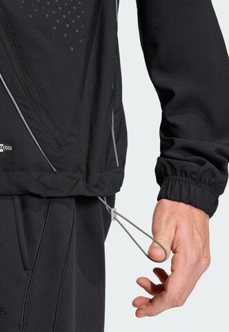 ADIDAS ORIGINALS Between-Season Jacket 'F50' in Black