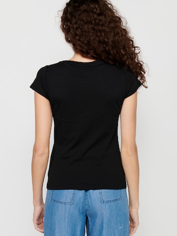 Tricou de la KOROSHI pe negru