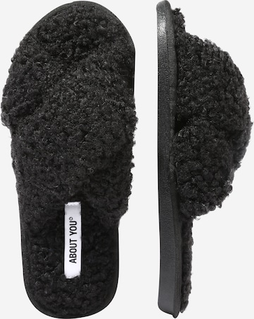 ABOUT YOU Slippers 'Betty' in Black