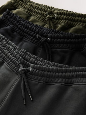 Next Дънки Tapered Leg Панталон в сиво