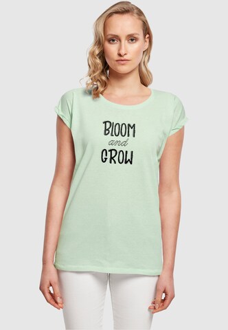 T-shirt 'Spring - Bloom And Grow' Merchcode en vert : devant