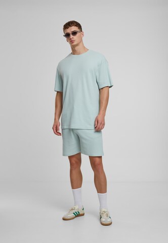 Urban Classics Loose fit Trousers in Green