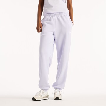 new balance Hosen 'Sport Essentials French Terry Jogger'. in Lila: Vorderseite