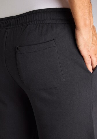 JOHN DEVIN Regular Trousers in Black