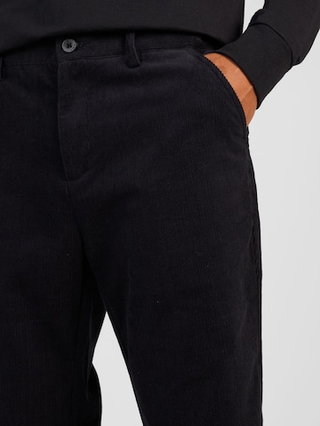 MELAWEAR Regular Trousers in Black