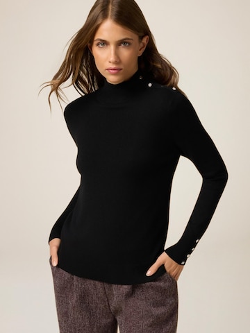 Pullover di oltre in nero
