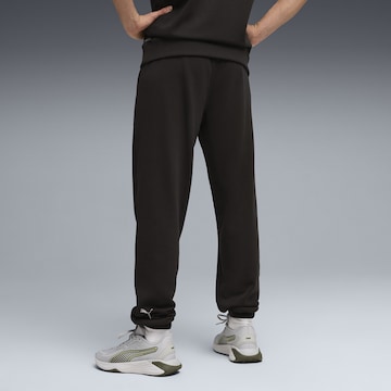 Effilé Pantalon de sport PUMA en noir