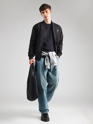 NAPAPIJRI T-shirt 'S-NEDLES' i svart