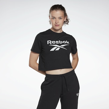 Reebok - Camiseta en negro: frente