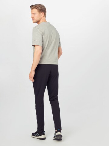 juoda ADIDAS SPORTSWEAR Prigludęs Sportinės kelnės 'Essentials Tapered'