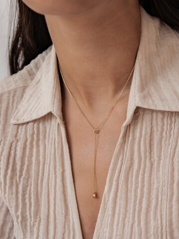 Hey Happiness Halsband 'Heart Lariat' i guld: framsida