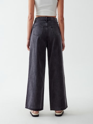 Calli Wide leg Jeans i svart: baksida