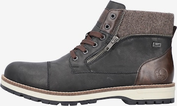 Rieker - Botas con cordones en negro