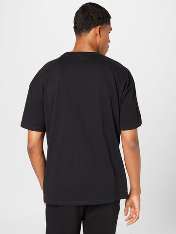 PUMA T-Shirt in Schwarz