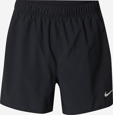 Pantaloni sport de la NIKE pe negru: față