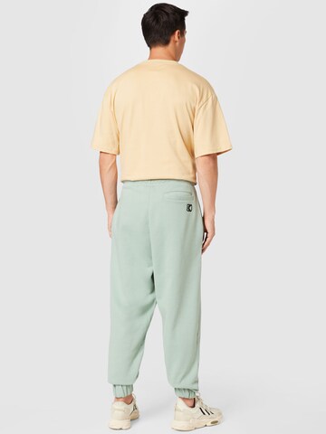 Karl Kani Tapered Pants in Green