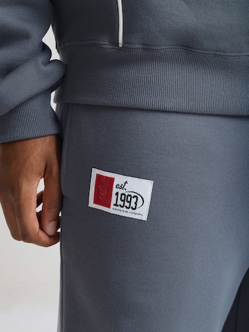 AND1 Regular Sporthose in Blau: Vorderseite