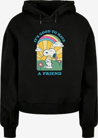 Merchcode Sweatshirt 'Peanuts - It's good to have a friend' in Schwarz: predná strana