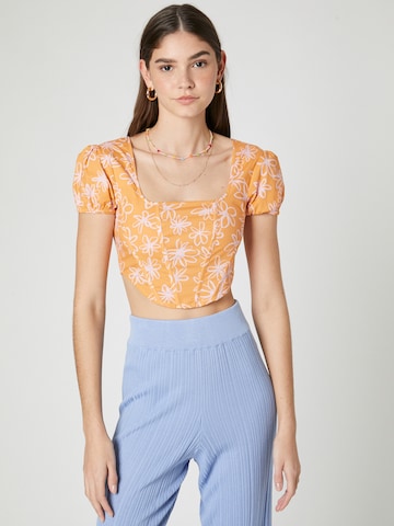 florence by mills exclusive for ABOUT YOU Top 'Date' in Oranje: voorkant