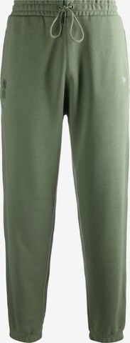 NEW ERA Tapered Broek in Groen: voorkant