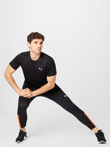 PUMA Slimfit Sportbroek in Zwart