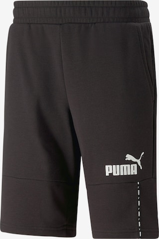 PUMA Regular Sports trousers in Black: front