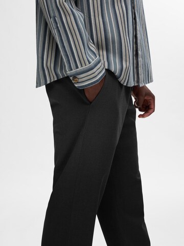 Regular Pantalon 'SLHROBERT' SELECTED en noir