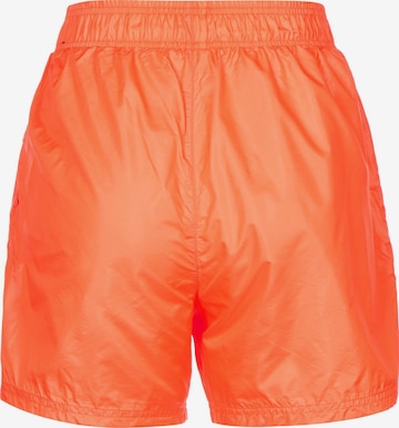Nike Sportswear Loosefit Broek in Oranje