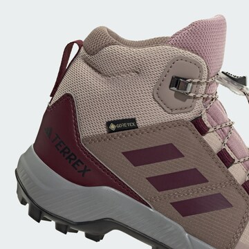 ADIDAS TERREX - Botas em roxo