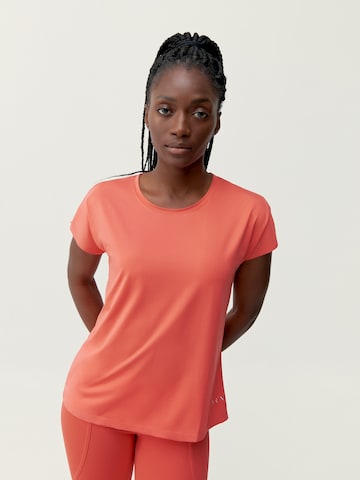T-shirt fonctionnel 'Aina' Born Living Yoga en orange : devant
