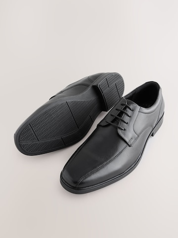 Chaussure à lacets Next en noir