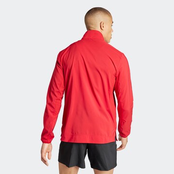 Veste de sport ADIDAS PERFORMANCE en rouge