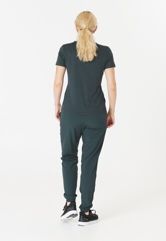 ENDURANCE Tapered Sports trousers 'Chaya' in Green