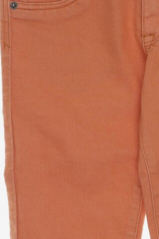 RIP CURL Jeans 27-28 in Orange