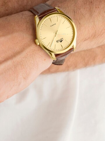 Montre à affichage analogique Lotus en or