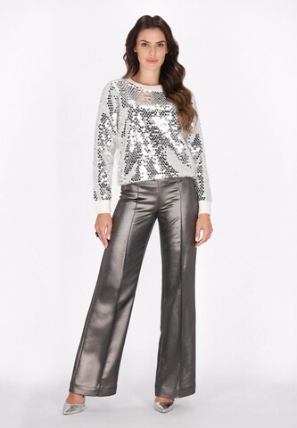 Pullover di faina in bianco
