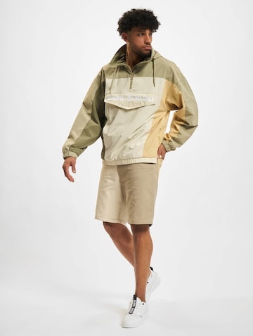 Karl Kani Regular Shorts in Beige