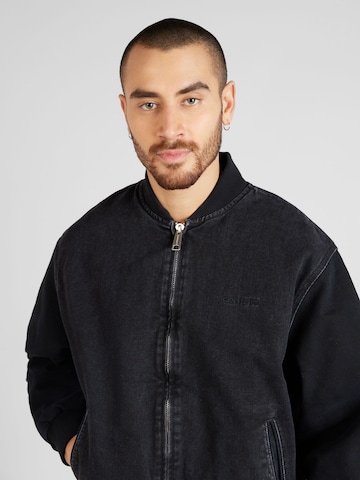 Carhartt WIP Between-season jacket 'Paxon' in Black