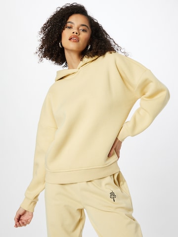 ABOUT YOU x INNA Sweatshirt 'Alessia' in Beige: front