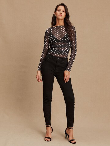 Next Skinny Jeggings in Schwarz