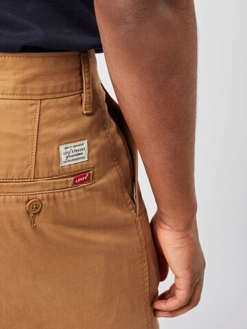 LEVI'S ® Loosefit Chino kalhoty 'XX Stay Loose Chino Crop' – béžová