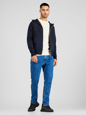 Coupe slim Jean 'Skanton' Tommy Jeans en bleu