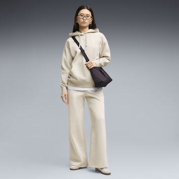 PUMA Wide leg Trousers 'Essentials Cat' in Beige