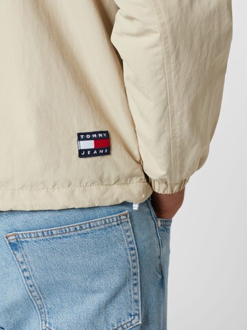 Tommy Jeans Välikausitakki 'Chicago' värissä beige