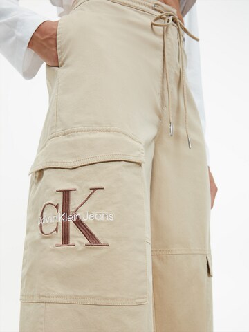 Calvin Klein Jeans Ohlapna forma Kargo hlače | bež barva