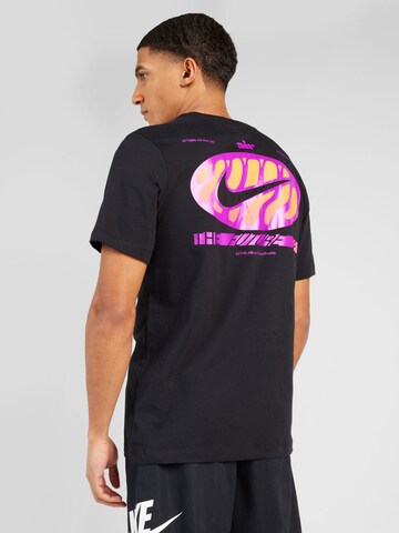 T-Shirt 'AIR' Nike Sportswear en noir : devant