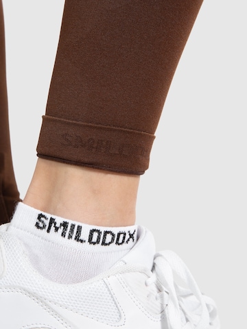 Smilodox Skinny Sporthose 'Amaze Pro' in Braun