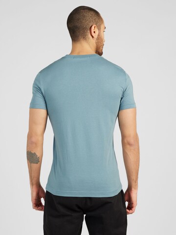 Calvin Klein Jeans T-shirt 'STACKED BOX' i blå